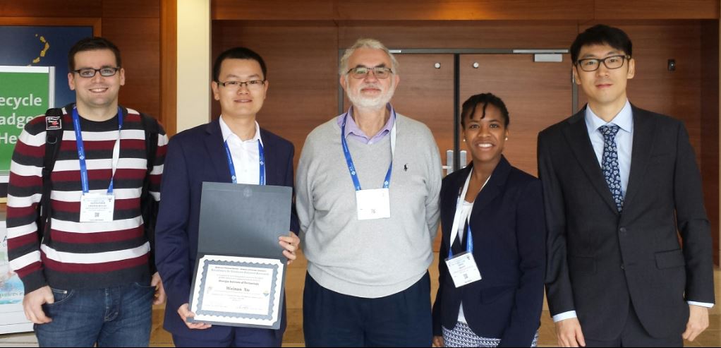 Weinan Xu pictured with his award and colleagues after presenting in the Division of Polymer Chemistry Excellence in Graduate Polymer Research Symposium.  Those featured are Weinan Xu, Prof. Tsukruk, Anise Grant, and Ju-Won Jeon (L-R).
